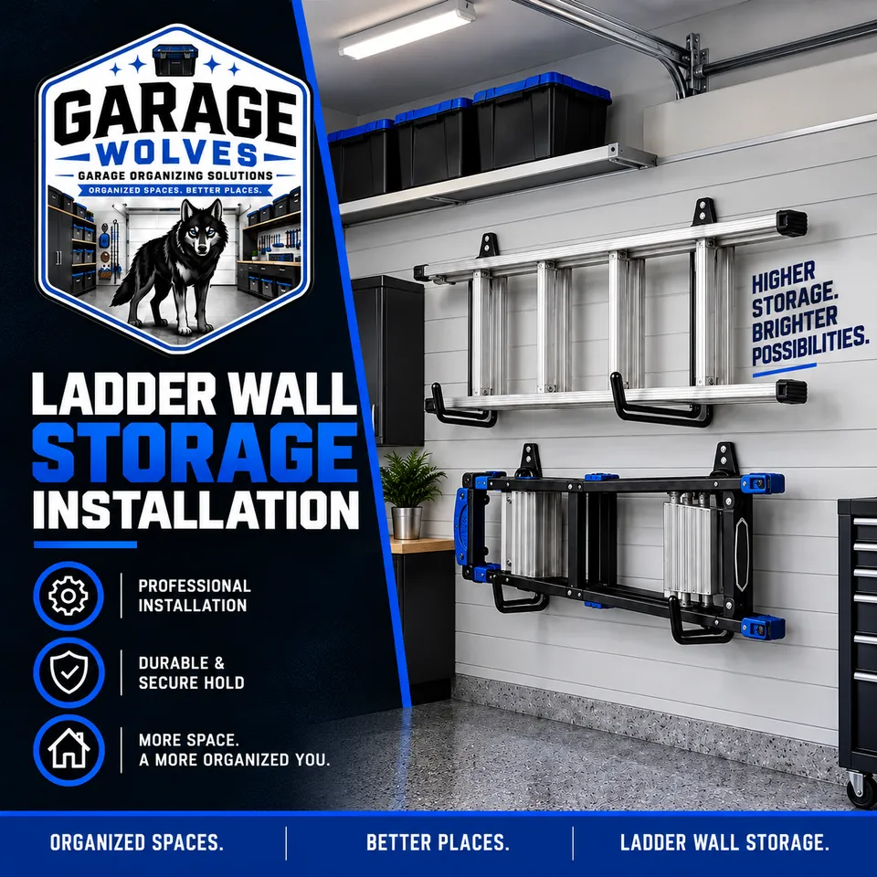 An extension ladder and a folding step ladder held on wall brackets above a garage workbench, clear of the floor